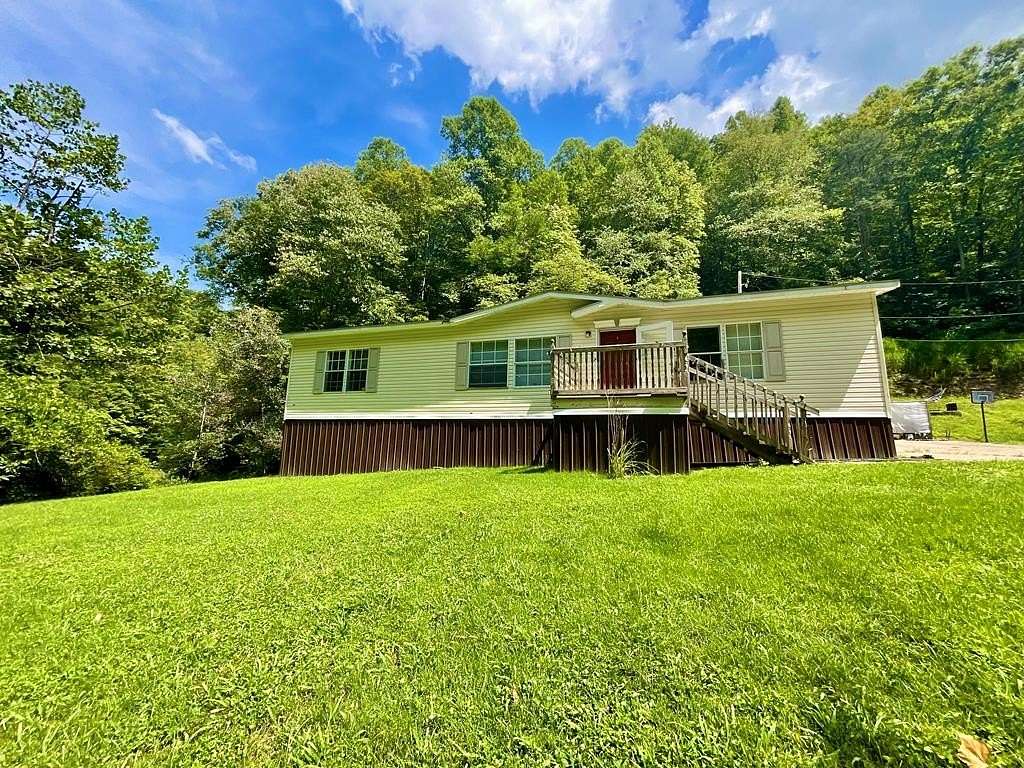 24 Acres of Land with Home for Sale in Forest Hills, Kentucky