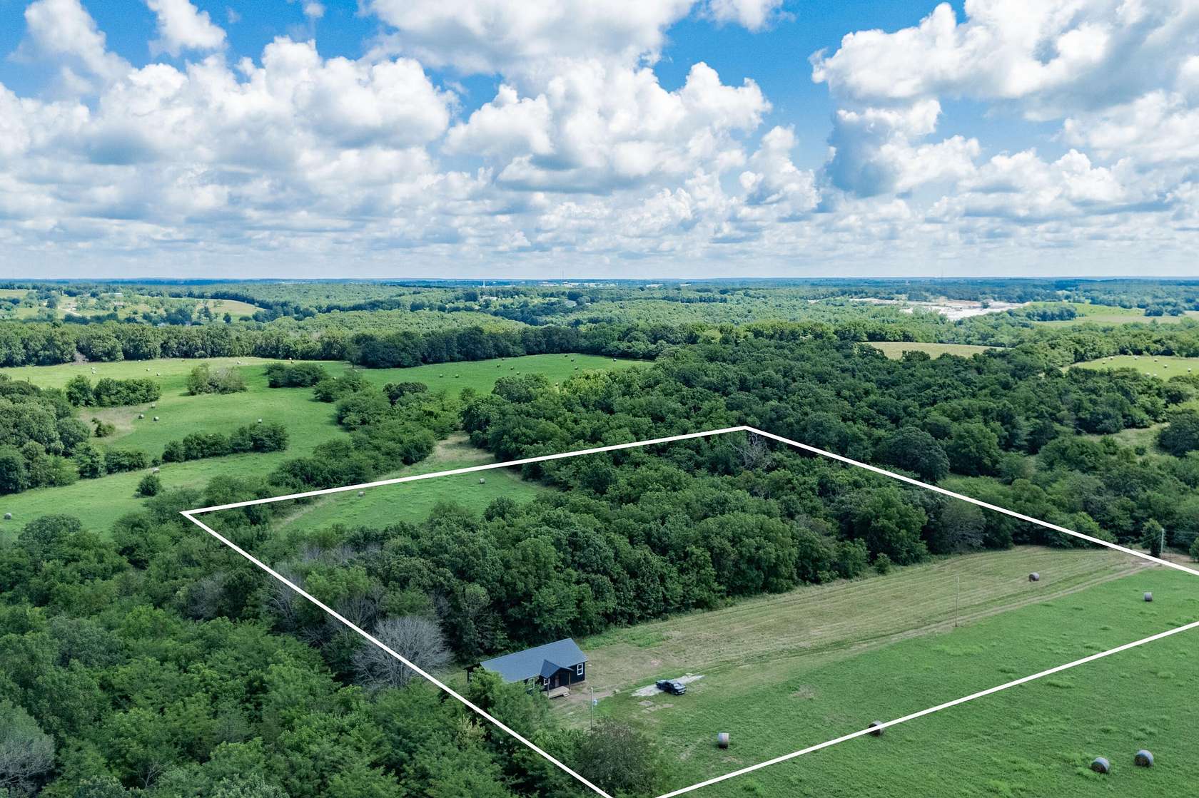 9.8 Acres of Residential Land with Home for Sale in Stockton, Missouri