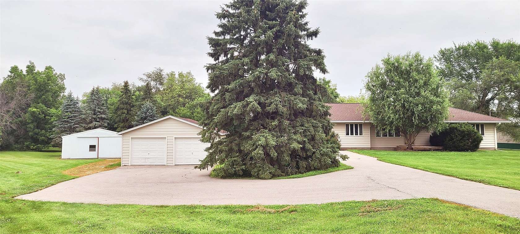 5.46 Acres of Residential Land with Home for Sale in Runnells, Iowa