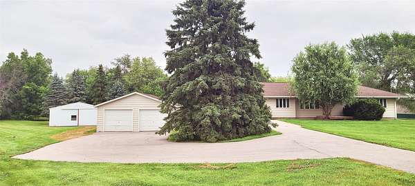 5.46 Acres of Residential Land with Home for Sale in Runnells, Iowa