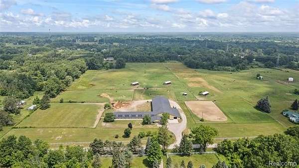 30.8 Acres of Agricultural Land with Home for Sale in Dryden Township, Michigan