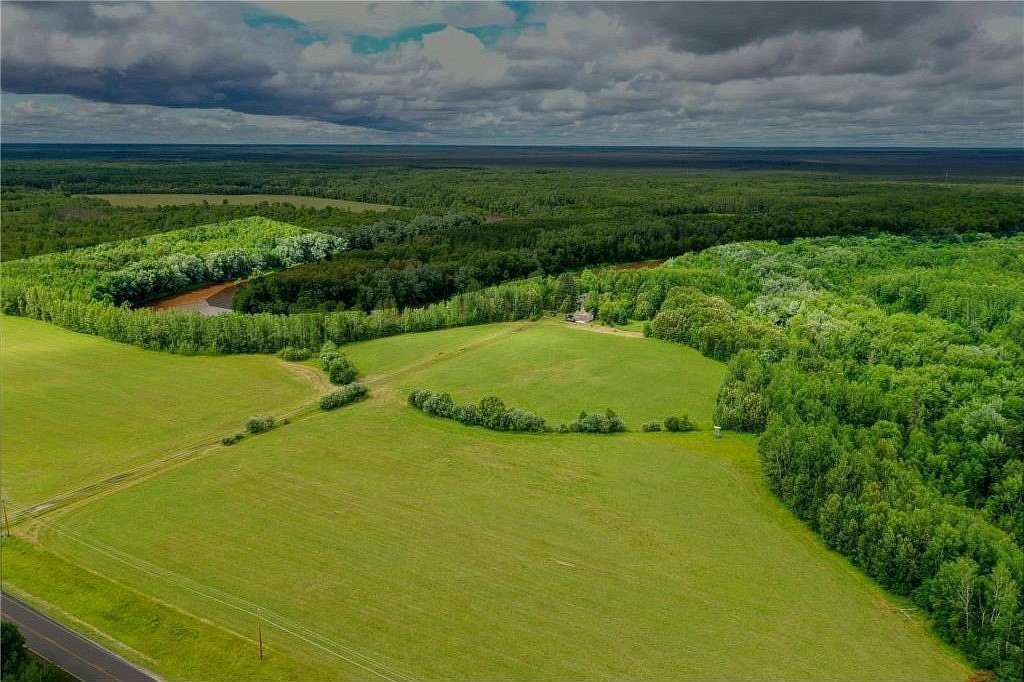 210 Acres of Land with Home for Sale in International Falls, Minnesota