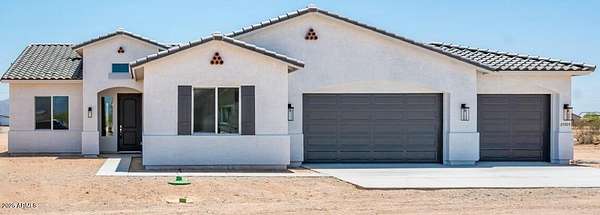 1.6 Acres of Residential Land with Home for Sale in Wittmann, Arizona