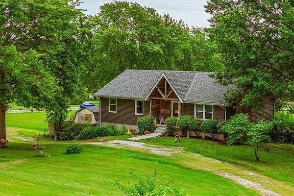 2.3 Acres of Residential Land with Home for Sale in Peculiar, Missouri