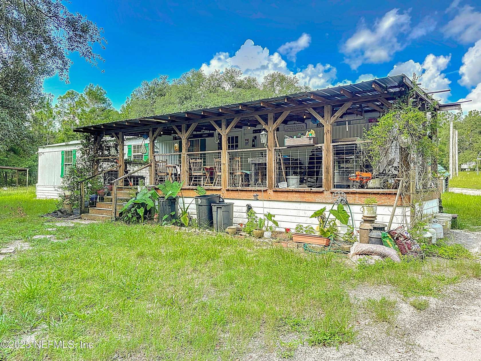 5.3 Acres of Residential Land with Home for Sale in Keystone Heights, Florida