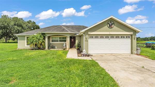 5.13 Acres of Residential Land with Home for Sale in Dade City, Florida