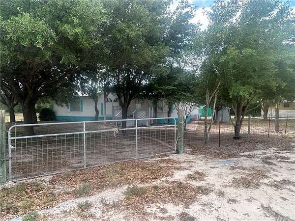 1.5 Acres of Residential Land with Home for Sale in Orange Grove, Texas