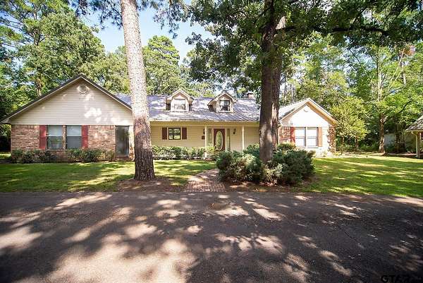 1.58 Acres of Residential Land with Home for Sale in Holly Lake Ranch, Texas