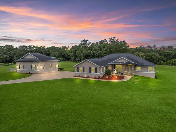 5.49 Acres of Land with Home for Sale in Weirsdale, Florida