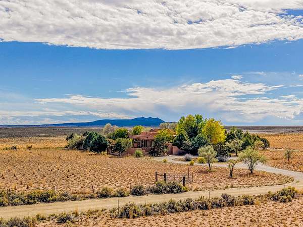 110 Acres of Land with Home for Sale in El Prado, New Mexico