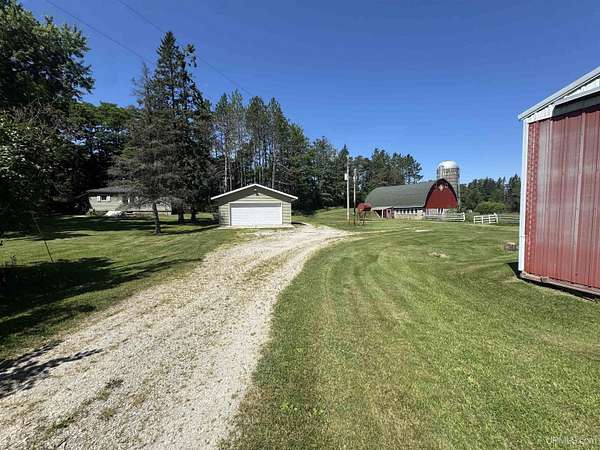 107 Acres of Agricultural Land with Home for Sale in Daggett, Michigan