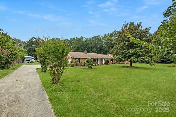 1.9 Acres of Residential Land with Home for Sale in Matthews, North Carolina