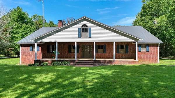 1.54 Acres of Residential Land with Home for Sale in McKenzie, Tennessee