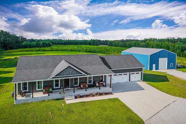 32.2 Acres of Recreational Land with Home for Sale in Baxter, Tennessee