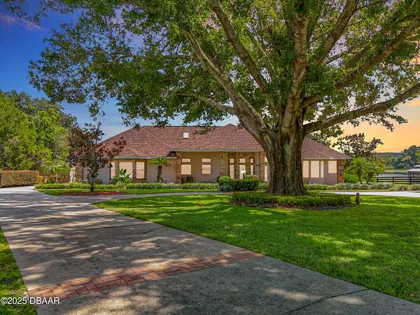 2.4 Acres of Residential Land with Home for Sale in Eustis, Florida