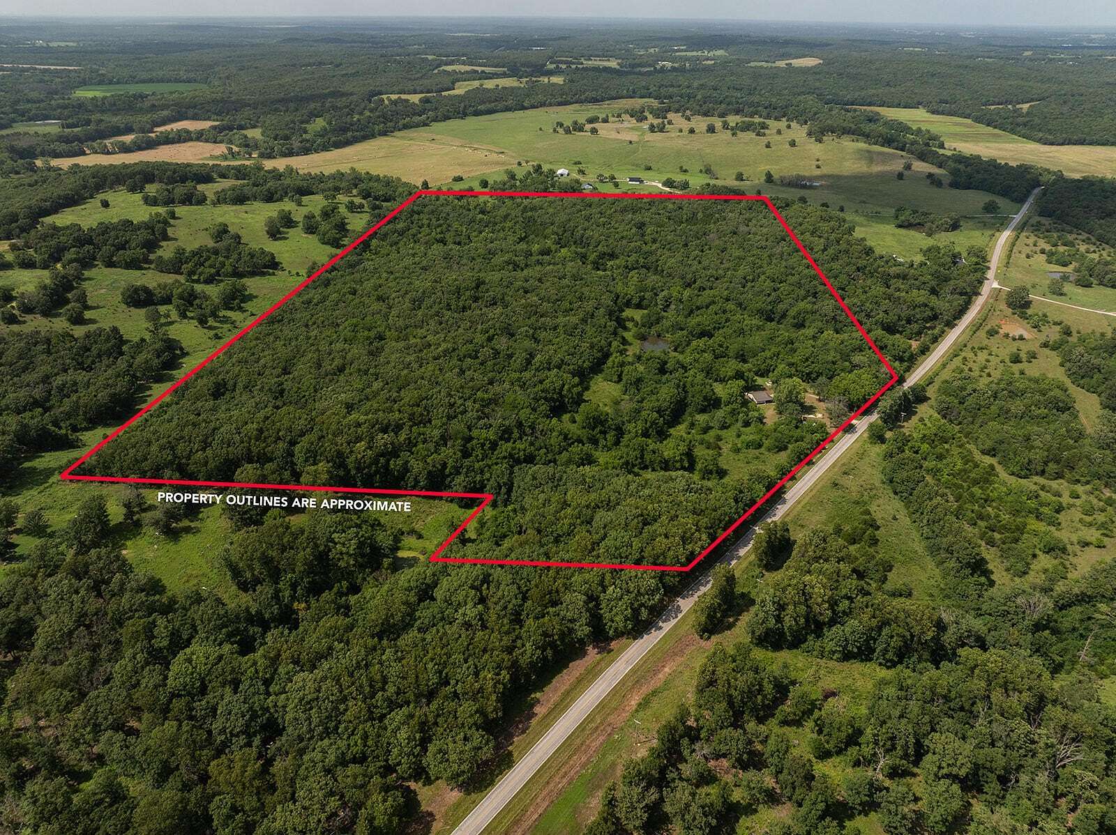 72 Acres of Land with Home for Sale in Collins, Missouri