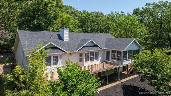 4 Acres of Residential Land with Home for Sale in Sunrise Beach, Missouri