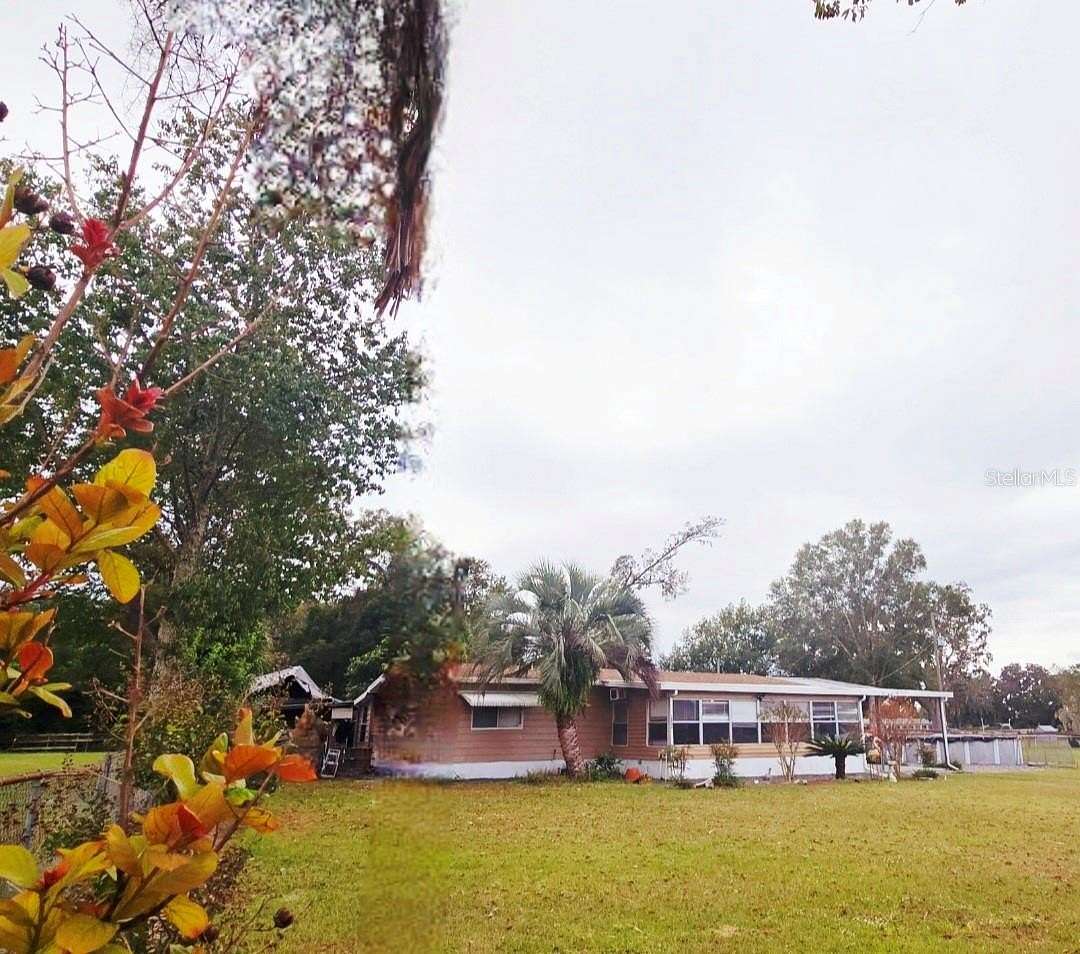 2.24 Acres of Residential Land with Home for Sale in Summerfield, Florida