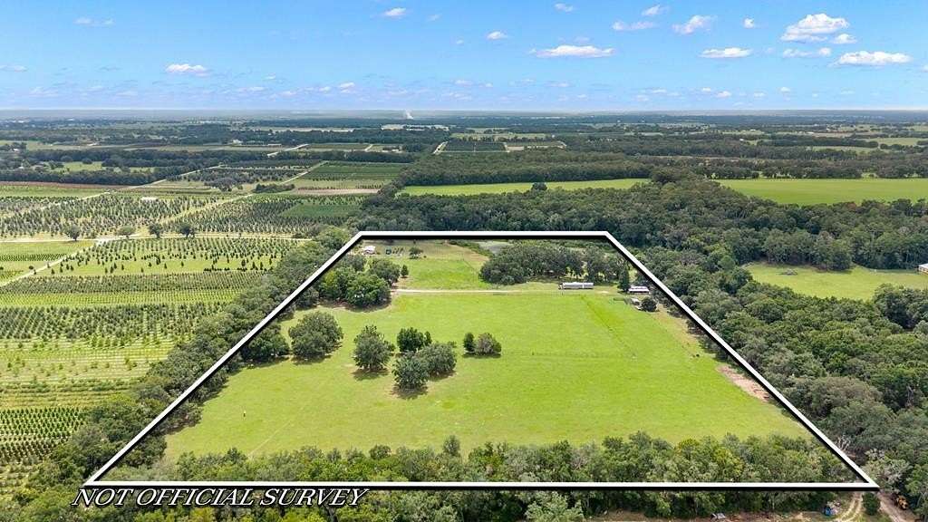 24.5 Acres of Agricultural Land with Home for Sale in Morriston, Florida