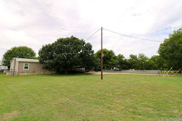 2.7 Acres of Residential Land with Home for Sale in Center Point, Texas
