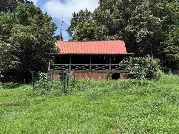 10.7 Acres of Land with Home for Sale in Marion, Kentucky