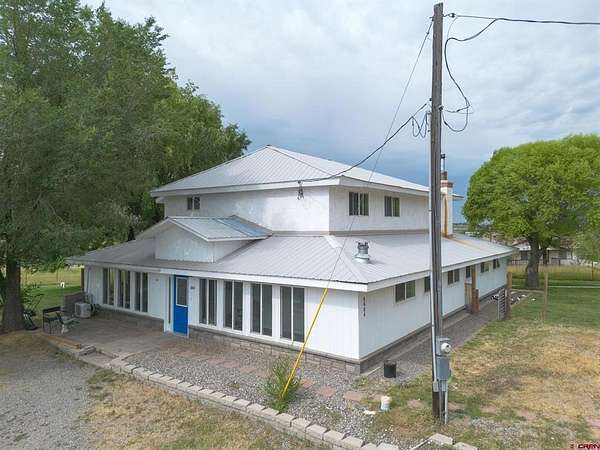 9.2 Acres of Residential Land with Home for Sale in Bayfield, Colorado