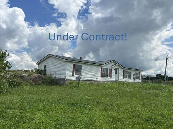 40 Acres of Agricultural Land with Home for Auction in Rose, Oklahoma