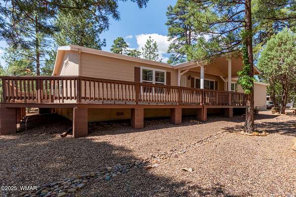 1.82 Acres of Land with Home for Sale in Overgaard, Arizona