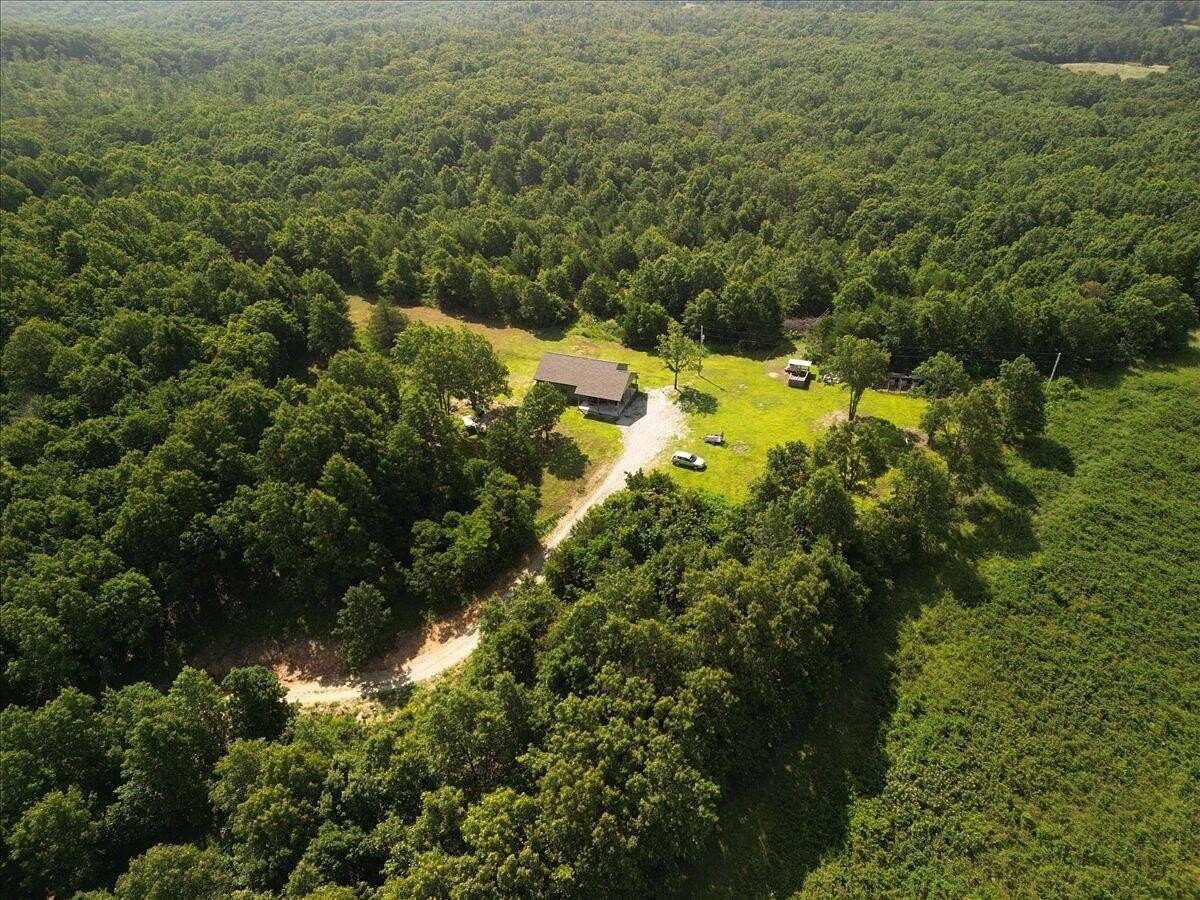 10.5 Acres of Recreational Land with Home for Sale in Mountain Grove, Missouri