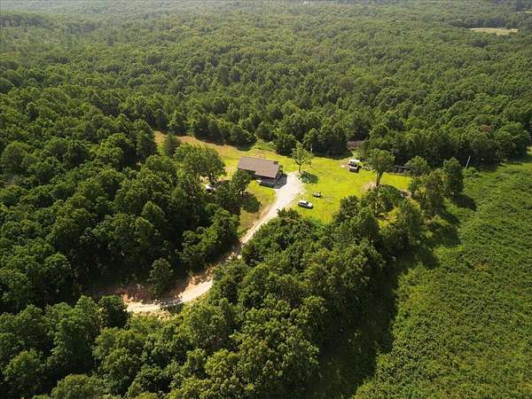 10.5 Acres of Recreational Land with Home for Sale in Mountain Grove, Missouri