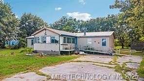 1.8 Acres of Residential Land with Home for Sale in Okmulgee, Oklahoma
