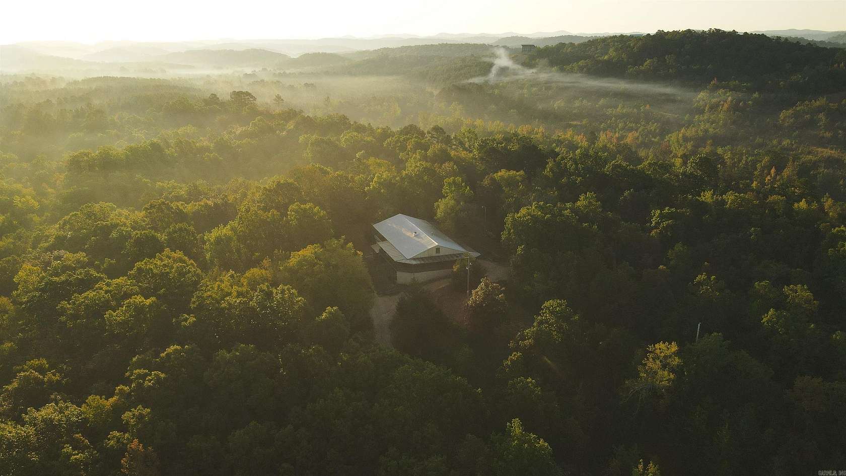 22.4 Acres of Recreational Land with Home for Sale in Mena, Arkansas