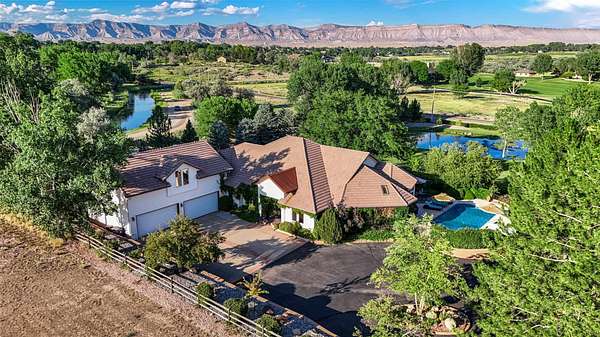 1.85 Acres of Residential Land with Home for Sale in Grand Junction, Colorado