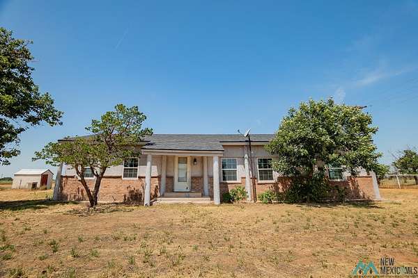 10 Acres of Residential Land with Home for Sale in Portales, New Mexico
