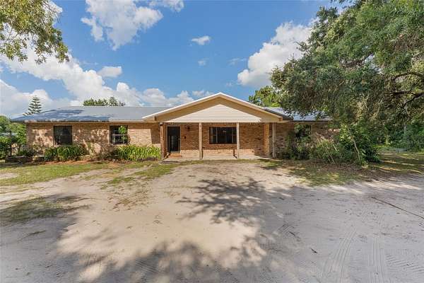 5 Acres of Residential Land with Home for Sale in Oviedo, Florida