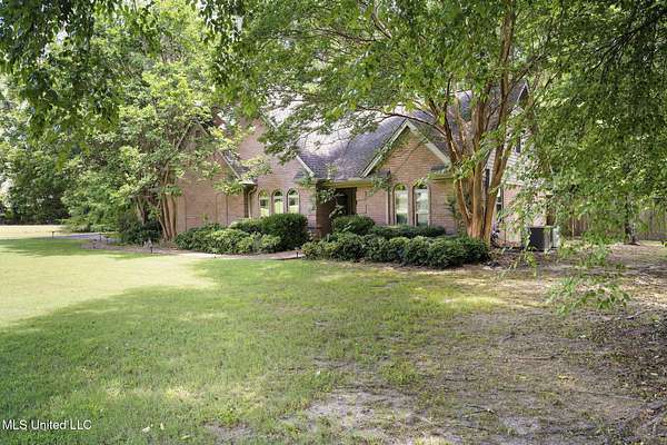 2.23 Acres of Residential Land with Home for Sale in Olive Branch, Mississippi