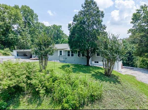 5.6 Acres of Residential Land with Home for Sale in Sparta, Tennessee