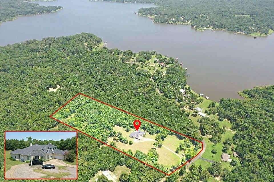 10 Acres of Residential Land with Home for Sale in Scroggins, Texas