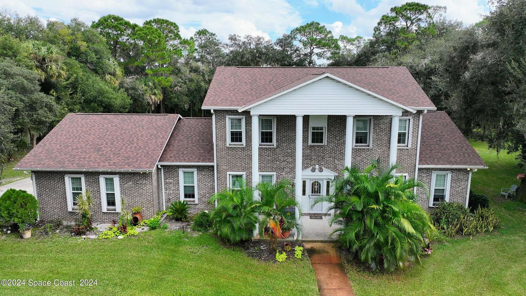 2.15 Acres of Residential Land with Home for Sale in Titusville, Florida