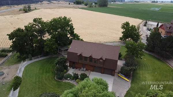 16 Acres of Land with Home for Sale in Murtaugh, Idaho
