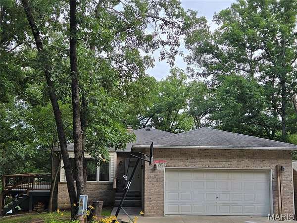 4.7 Acres of Residential Land with Home for Sale in Fulton, Missouri