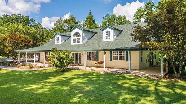 10 Acres of Residential Land with Home for Sale in McDonald, Tennessee