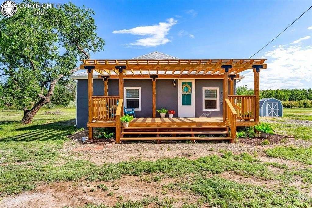 4.89 Acres of Land with Home for Sale in Florence, Colorado