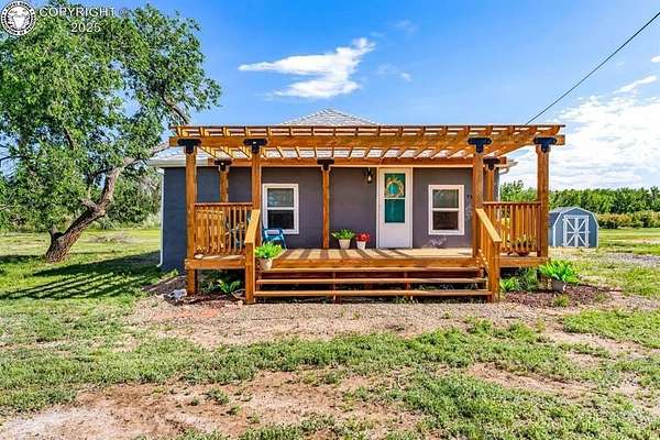 4.89 Acres of Land with Home for Sale in Florence, Colorado
