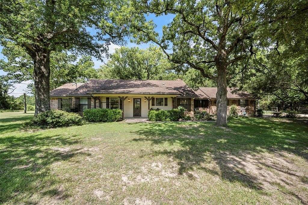 11.6 Acres of Land with Home for Sale in Scurry, Texas