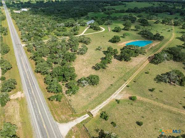 20.7 Acres of Recreational Land with Home for Sale in Yoakum, Texas