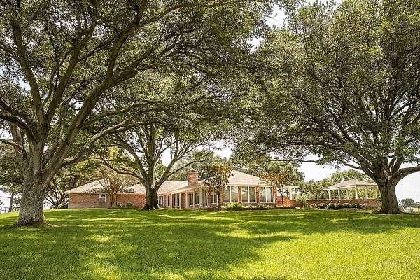 30.9 Acres of Agricultural Land with Home for Auction in Brenham, Texas