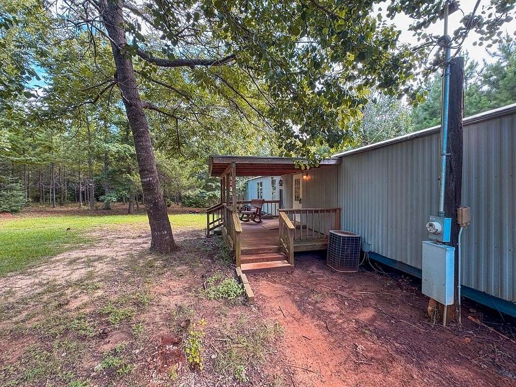 3.82 Acres of Residential Land with Home for Sale in Elkhart, Texas