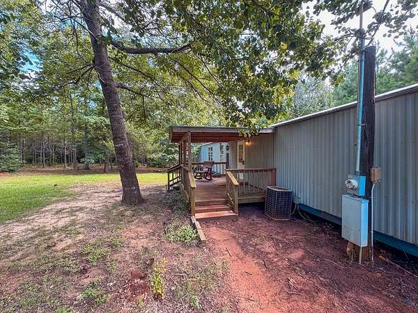 3.82 Acres of Residential Land with Home for Sale in Elkhart, Texas