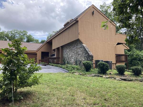 25.6 Acres of Recreational Land with Home for Sale in Crane, Missouri